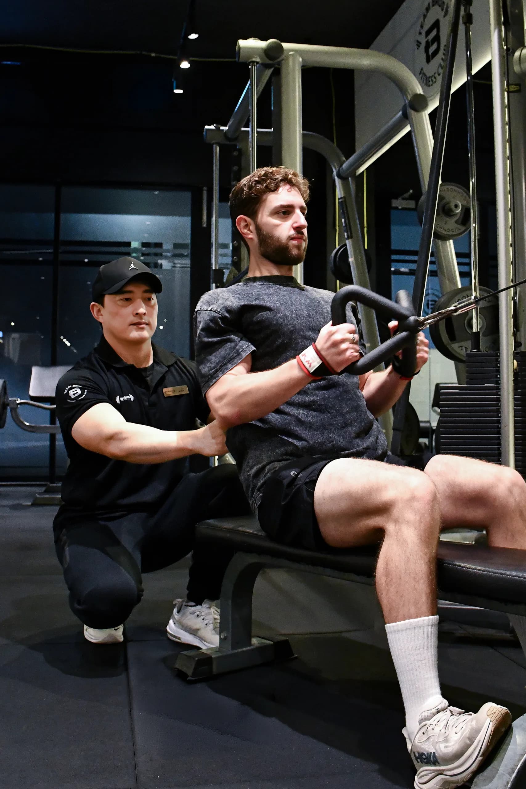 Personal trainer ceo founder Yohan Lim coaching a member at Teambros West Ryde